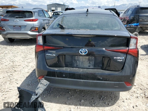 2020 Toyota Prius L Eco z VIN JTDKARFU7L3111913, wystawiony jako Copart lot #54544995 z przebiegiem 85 988 mil mil oraz Szkoda całkowita • Salvage title. Historia ofert i sprzedaży dostępna na DreamBid. Obrazek 6.