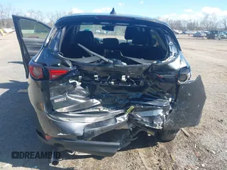 2020 Mazda CX-5 Grand Touring with VIN JM3KFBDM1L0821975, listed as a IAAI auction lot 40088794 with 68,895 mi miles and . Bid and sale history available at DreamBid. Image 6.