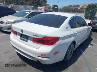 2018 BMW 5 Series 530e with VIN WBAJA9C58JB252868, listed as a IAAI auction lot 42323949 with 100,530 mi miles and . Bid and sale history available at DreamBid. Image 4.