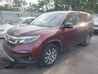 2019 Honda Pilot EX-L z VIN 5FNYF5H5XKB045563, wystawiony jako IAAI lot #42329311 z przebiegiem 46 903 mil mil oraz . Historia ofert i sprzedaży dostępna na DreamBid. Obrazek 2.