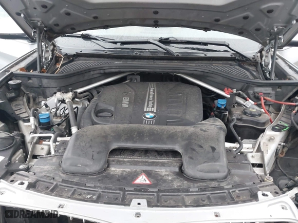 2015 BMW X5 xDrive35d with VIN 5UXKS4C51F0N06221, listed as a IAAI auction lot 41568976 with 162,442 mi miles. Bid and sale history available at carsss.com. Image 10.