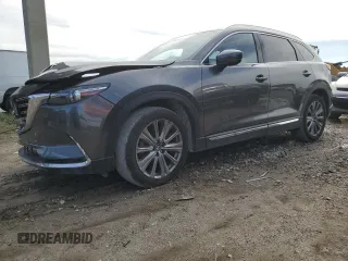 2023 Mazda CX-9 Signature with VIN JM3TCBEYXP0632844, listed as a Copart auction lot 87180834 with 20,415 mi miles and Salvage title. Bid and sale history available at DreamBid. Image 1.