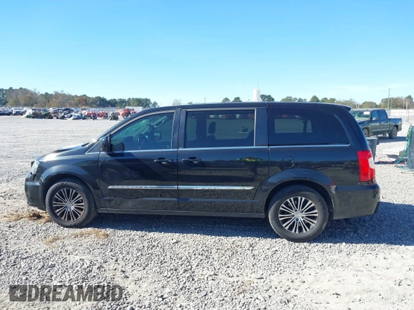 2014 Chrysler Town & Country S with VIN 2C4RC1HGXER225397, listed as a IAAI auction lot 41023867 with 180,093 mi miles and . Bid and sale history available at DreamBid. Image 14.