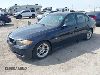 2008 BMW 3 Series 328i with VIN WBAVA375X8NL47238, listed as a IAAI auction lot 42029393 with 146,664 mi miles. Bid and sale history available at carsss.com. Image 2.