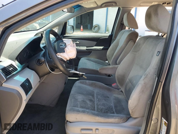 2012 Honda Odyssey LX z VIN 5FNRL5H2XCB147224, wystawiony jako Copart lot #59165425 z przebiegiem 214 730 mil mil oraz Szkoda całkowita • Salvage title. Historia ofert i sprzedaży dostępna na DreamBid. Obrazek 7.