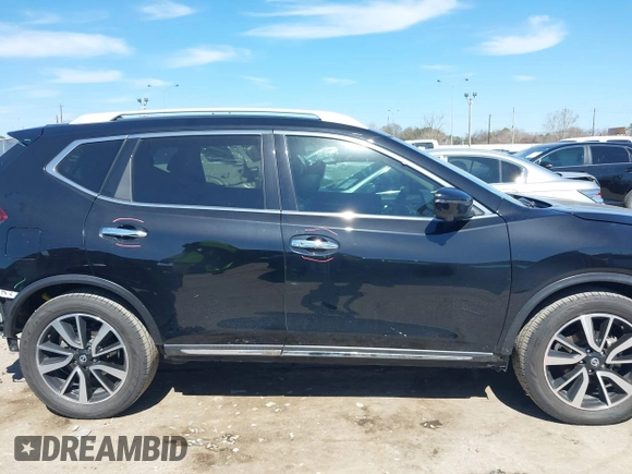 2019 Nissan Rogue SL with VIN 5N1AT2MTXKC813158, listed as a IAAI auction lot 41665354 with 62,605 mi miles and . Bid and sale history available at DreamBid. Image 14.