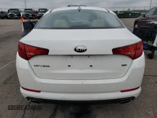2013 Kia Optima LX z VIN KNAGM4A79D5327301, wystawiony jako Copart lot #55595565 z przebiegiem 100 366 mil mil oraz Szkoda całkowita • Salvage title. Historia ofert i sprzedaży dostępna na DreamBid. Obrazek 6.