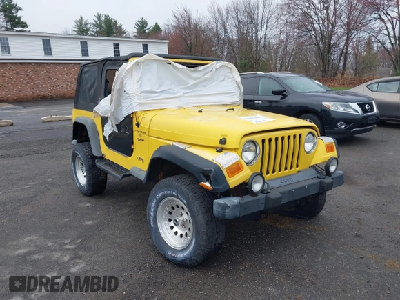 2000 Jeep Wrangler Sport with VIN 1J4FA49S9YP736984, listed as a IAAI auction lot 42055385 with 191,910 mi miles and . Bid and sale history available at DreamBid. Image 6.