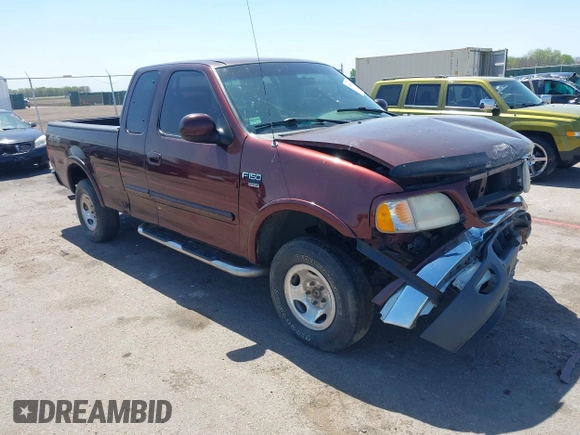 2000 Ford F-150 XL with VIN 1FTRX18L5YNA99713, listed as a IAAI auction lot 42194838 with Not provided miles and . Bid and sale history available at DreamBid. Image 1.