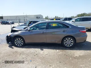 2015 Toyota Camry XLE with VIN 4T1BF1FK0FU952421, listed as a IAAI auction lot 41714622 with 125,553 mi miles and . Bid and sale history available at DreamBid. Image 14.