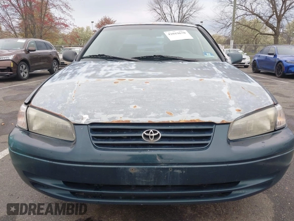 1997 Toyota Camry LE z VIN 4T1BG22K5VU024448, wystawiony jako IAAI lot #42019670 z przebiegiem 133 385 mil mil oraz . Historia ofert i sprzedaży dostępna na DreamBid. Obrazek 6.