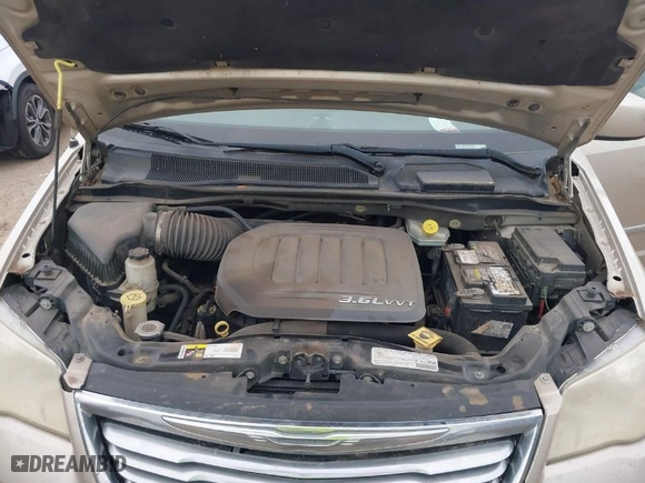 2013 Chrysler Town & Country Touring with VIN 2C4RC1BG7DR721863, listed as a IAAI auction lot 41912250 with 243,444 mi miles. Bid and sale history available at carsss.com. Image 10.