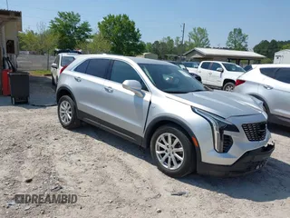 2019 Cadillac XT4 FWD Luxury with VIN 1GYAZAR43KF211662, listed as a IAAI auction lot 41970500 with 28,167 mi miles. Bid and sale history available at carsss.com. Image 1.