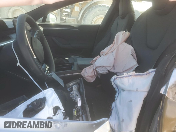 2024 Tesla Model S с VIN 5YJSA1E56RF541102, выставлен на аукционе Copart как лот 42584275 с пробегом Не указан миль и Списание • Salvage title. История ставок и продаж доступна на DreamBid. Изображение 7.