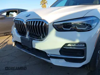 2021 BMW X5 sDrive40i with VIN 5UXCR4C03M9G59554, listed as a IAAI auction lot 41358056 with 47,577 mi miles. Bid and sale history available at carsss.com. Image 18.