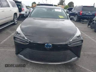 2021 Toyota Mirai XLE with VIN JTDAAAAA1MA002323, listed as a IAAI auction lot 42034157 with 16,592 mi miles and . Bid and sale history available at carsss.com. Image 12.