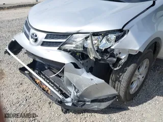 2014 Toyota RAV4 LE with VIN JTMBFREV9ED095397, listed as a IAAI auction lot 41866606 with 100,290 mi miles. Bid and sale history available at carsss.com. Image 6.