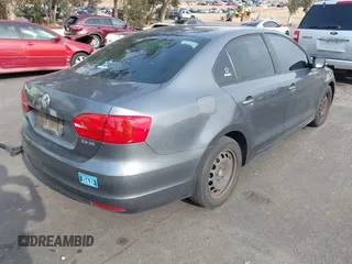 2012 Volkswagen Jetta SE with VIN 3VWDP7AJ8CM330366, listed as a IAAI auction lot 41450611 with 256,079 mi miles and . Bid and sale history available at DreamBid. Image 4.