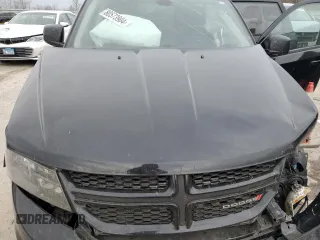 2019 Dodge Journey SE z VIN 3C4PDCBB1KT719203, wystawiony jako Copart lot #86170744 z przebiegiem Nie podano mil oraz Szkoda całkowita • Salvage title. Historia ofert i sprzedaży dostępna na DreamBid. Obrazek 12.