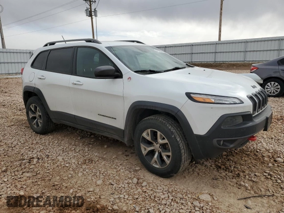 2014 Jeep Cherokee Trailhawk with VIN 1C4PJMBS7EW183855, listed as a Copart auction lot 46143085 with 146,901 mi miles and Salvage Title. Bid and sale history available at DreamBid. Image 4.