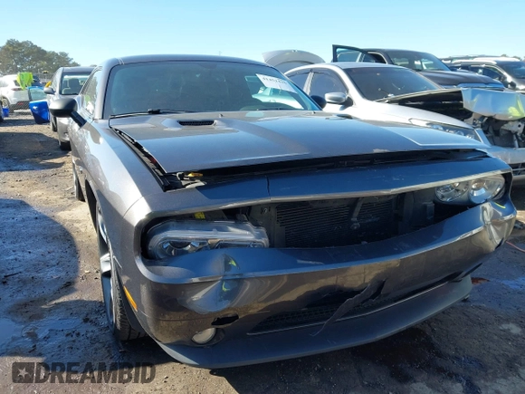 2014 Dodge Challenger R/T z VIN 2C3CDYBT7EH293104, wystawiony jako IAAI lot #41452435 z przebiegiem 49 728 mil mil oraz . Historia ofert i sprzedaży dostępna na DreamBid. Obrazek 6.