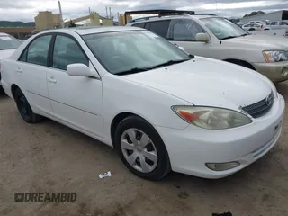 2004 Toyota Camry LE with VIN 4T1BF30K74U073676, listed as a IAAI auction lot 41668460 with 249,847 mi miles. Bid and sale history available at carsss.com. Image 1.