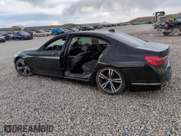 2017 BMW 7 Series 750i с VIN WBA7F0C35HGM21697, выставлен на аукционе Copart как лот 54713825 с пробегом Не указан миль и Списание • Salvage title. История ставок и продаж доступна на DreamBid. Изображение 2.