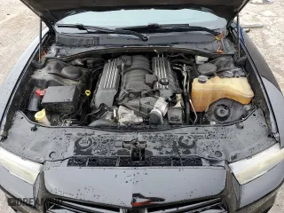 2012 Dodge Charger SRT8 with VIN 2C3CDXEJ8CH217246, listed as a Copart auction lot 71079334 with 105,528 mi miles and Salvage Title. Bid and sale history available at carsss.com. Image 11.