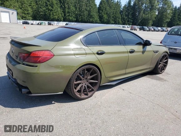 2017 BMW M6 z VIN WBS6E9C53HG437414, wystawiony jako Copart lot #61141685 z przebiegiem 89 893 mil mil oraz Szkoda całkowita • Salvage title. Historia ofert i sprzedaży dostępna na DreamBid. Obrazek 3.