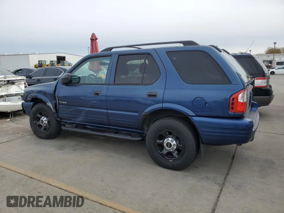 2003 Isuzu Rodeo z VIN 4S2DM58W234305979, wystawiony jako Copart lot #81346314 z przebiegiem 177 272 mil mil oraz Szkody całkowita. Historia ofert i sprzedaży dostępna na DreamBid. Obrazek 2.