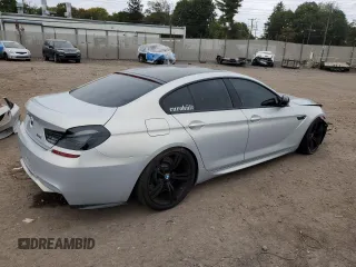 2015 BMW M6 z VIN WBS6C9C55FD467907, wystawiony jako Copart lot #72682374 z przebiegiem 25 841 mil mil oraz Szkoda całkowita • Salvage title. Historia ofert i sprzedaży dostępna na DreamBid. Obrazek 3.