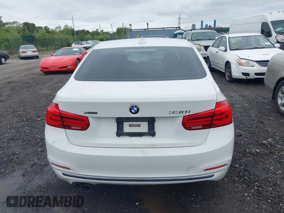2018 BMW 3 Series 330i xDrive with VIN WBA8D9C52JEM32318, listed as a IAAI auction lot 42309352 with 61,828 mi miles and . Bid and sale history available at DreamBid. Image 16.