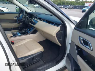 2018 Land Rover Range Rover Velar S z VIN SALYB2RV2JA746977, wystawiony jako IAAI lot #42423513 z przebiegiem 148 062 mil mil oraz . Historia ofert i sprzedaży dostępna na DreamBid. Obrazek 5.