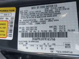 2015 Ford Fusion SE Hybrid with VIN 3FA6P0LUXFR165766, listed as a IAAI auction lot 41409353 with 32,388 mi miles. Bid and sale history available at carsss.com. Image 9.