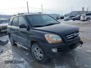 2006 Kia Sportage LX z VIN KNDJE723467227293, wystawiony jako IAAI lot #41588703 z przebiegiem 135 894 mil mil oraz . Historia ofert i sprzedaży dostępna na DreamBid. Obrazek 1.