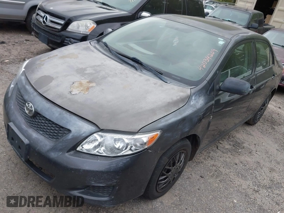 2009 Toyota Corolla with VIN 1NXBU40E99Z024895, listed as a IAAI auction lot 42034209 with 340,338 mi miles. Bid and sale history available at carsss.com. Image 2.