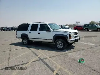 1994 Chevrolet Suburban z VIN 1GNGK26F1RJ444762, wystawiony jako Copart lot #86776674 z przebiegiem 354 375 mil mil oraz Szkoda całkowita • Salvage title. Historia ofert i sprzedaży dostępna na DreamBid. Obrazek 11.
