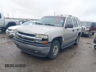2005 Chevrolet Tahoe LT with VIN 1GNEC13T65R153663, listed as a IAAI auction lot 41425751 with 283,051 mi miles and . Bid and sale history available at DreamBid. Image 2.