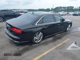2015 Audi A8 4.0T z VIN WAU32AFD9FN023826, wystawiony jako IAAI lot #42353372 z przebiegiem 94 833 mil mil oraz . Historia ofert i sprzedaży dostępna na DreamBid. Obrazek 4.