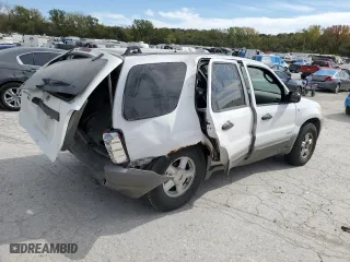 2001 Ford Escape XLT with VIN 1FMYU03121KC24061, listed as a Copart auction lot 75888584 with 155,901 mi miles and Salvage Title. Bid and sale history available at carsss.com. Image 3.