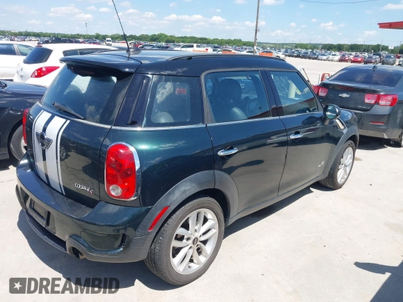 2011 MINI Countryman S with VIN WMWZC5C53BWM10484, listed as a IAAI auction lot 42250690 with 113,534 mi miles and . Bid and sale history available at DreamBid. Image 4.