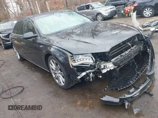 2012 Audi A8 L with VIN WAURVAFD8CN006917, listed as a IAAI auction lot 40877090 with 144,387 mi miles. Bid and sale history available at carsss.com. Image 1.