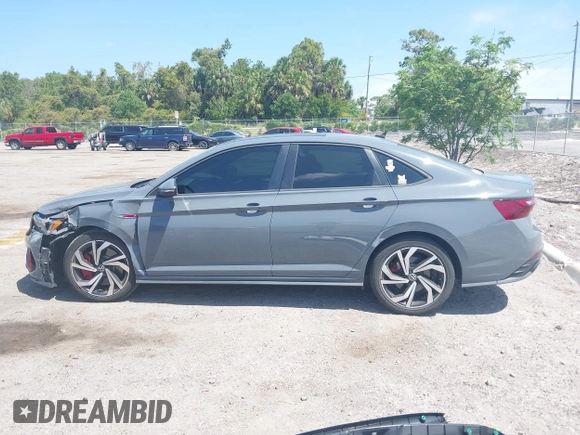2023 Volkswagen Jetta GLI Autobahn with VIN 3VW2T7BU0PM001596, listed as a IAAI auction lot 42120162 with 72,778 mi miles and . Bid and sale history available at DreamBid. Image 14.