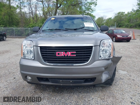 2007 GMC Yukon SLT z VIN 1GKFK13077R129885, wystawiony jako IAAI lot #42184207 z przebiegiem 264 848 mil mil oraz . Historia ofert i sprzedaży dostępna na DreamBid. Obrazek 12.
