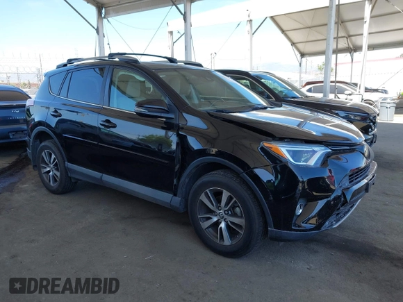 2018 Toyota RAV4 XLE with VIN 2T3WFREV2JW502622, listed as a IAAI auction lot 42327598 with 94,997 mi miles and . Bid and sale history available at DreamBid. Image 1.