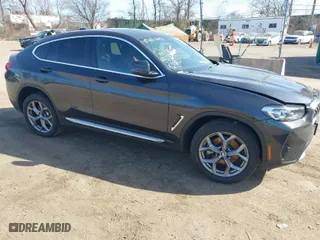 2024 BMW X4 xDrive30i with VIN 5UX33DT05R9X55093, listed as a IAAI auction lot 41811703 with 11,319 mi miles. Bid and sale history available at carsss.com. Image 1.