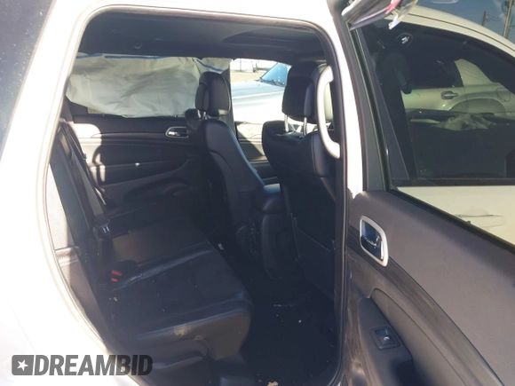 2021 Jeep Grand Cherokee Laredo X with VIN 1C4RJEAG6MC658195, listed as a IAAI auction lot 41414668 with 52,488 mi miles and . Bid and sale history available at DreamBid. Image 8.