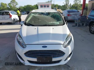 2019 Ford Fiesta SE with VIN 3FADP4EJ4KM136871, listed as a IAAI auction lot 42075343 with 89,185 mi miles and . Bid and sale history available at DreamBid. Image 13.