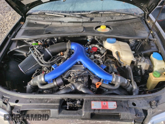 2000 Audi S4 z VIN WAUDD68D0YA031901, wystawiony jako Copart lot #84645964 z przebiegiem 146 868 mil mil oraz Szkody całkowita. Historia ofert i sprzedaży dostępna na DreamBid. Obrazek 11.