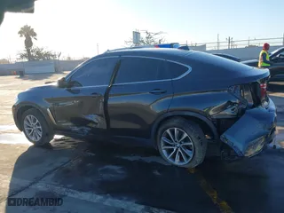 2019 BMW X6 sDrive35i with VIN 5UXKU0C57K0S97581, listed as a IAAI auction lot 41322568 with 76,635 mi miles. Bid and sale history available at carsss.com. Image 14.